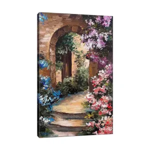 Canvastavla 70x100 cm - Vacker gränd med blommor som omger en båge av sten - Inredning & dekor Handla nu