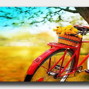 Canvastavla 70x100 cm - Röd cykel med en korg fylld av gula blommor - Inredning & dekor Nyhet