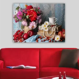 Canvastavla 70x100 cm - Färgglad stilleben med blommor, frukter och en kopp på en bokstapel - Inredning & dekor Erbjudandepris
