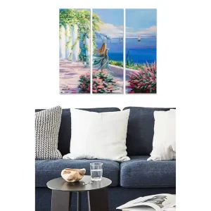 Canvastavla i trä 3-delar 50x70 cm - Vacker kvinna som blickar ut över havet med blommor i förgrunden - Inredning & dekor Lägg i varukorgen