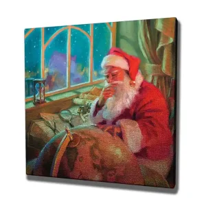 Canvastavla 45x45 cm - Reflekterande jultomte vid ett skrivbord med en glob och papper - Inredning & dekor Outlet
