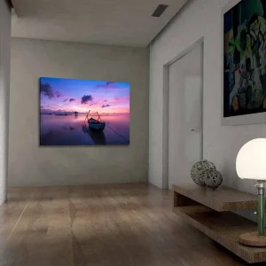 Canvastavla 70x100 cm - Stilla båt på en spegelblanka yta under en färgsprakande solnedgång - Inredning & dekor Beställ idag