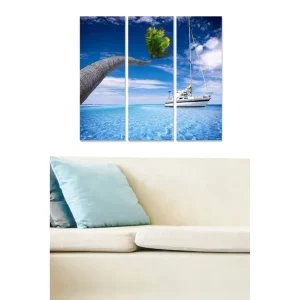 Canvastavla i trä 3-delar 50x70 cm - Segelbåt på ett klart blått hav med en palm som sträcker sig ut över vattnet - Inredning & dekor Sänkt pris