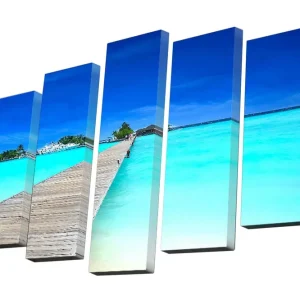Handla nu Canvastavla i 5 delar 82x50 cm - Klarblå himmel över en turkos lagun med en träbro Turkos / Blå / Vit - Inredning