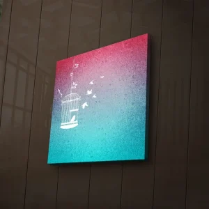 risnedsättning Canvastavla med LED-belysning 28x28 cm - Fängslande fågelbur med flygande fåglar i en drömlik bakgrund Rosa / Turkos - Inredning