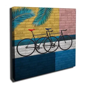 I lager Canvastavla 45x45 cm - Cyklar mot en färgglad vägg Gul / Blå / Svart - Inredning