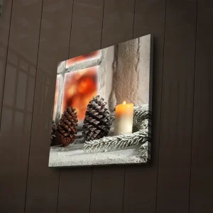 Nyhet Canvastavla med LED-belysning 40x40 cm - Kottar och ett ljus på en vinterinspirerad bakgrund Mörkbrun / Beige / Grön - Inredning