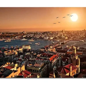 Canvastavla 70x100 cm - Vacker vy över Istanbul vid solnedgång, med takåsar och båtar på vattnet - Inredning & dekor Beställ idag
