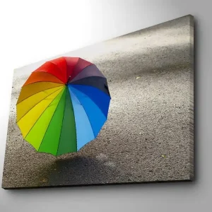 Canvastavla 70x100 cm - Färgglad paraply som står på en grå yta - Inredning & dekor Säker betalning