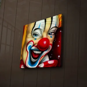 Erbjudande Canvastavla med LED-belysning 40x40 cm - Glad clown med färgglad smink och röd näsa Röd / Gul / Blå - Inredning