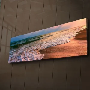 Canvastavla med LED-belysning 30x90 cm - Vacker strand med solnedgång och mjuka vågor Blå / Orange / Beige - Inredning Erbjudandepris