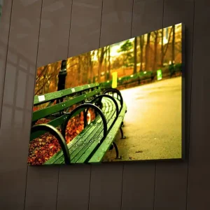 Canvastavla med LED-belysning 45x70 cm - Grön bänk i en höstig parkmiljö Grön / Gul / Brun - Inredning Populär