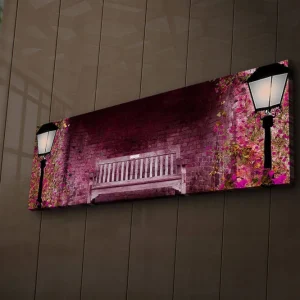 Canvastavla med LED-belysning 30x90 cm - Romantisk parkbänk omgiven av blommande växter Rosa / Grön / Brun - Inredning Snabb frakt