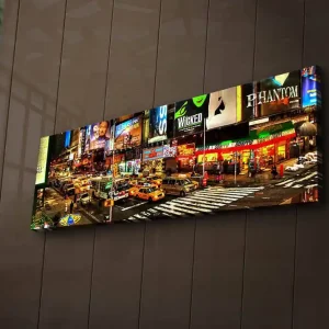 Canvastavla med LED-belysning 30x90 cm - Livlig stadsbild av Times Square med neonskyltar och trafik Gul / Grön / Röd - Inredning Nedsatt pris