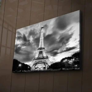 I lager Canvastavla med LED-belysning 45x70 cm - Dramatisk fotobild över upptänt Eiffeltorn i Paris med molnhimmel i svartvit Svart / Vit - Inredning