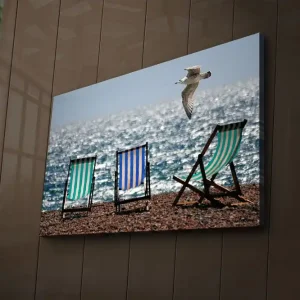 Canvastavla med LED-belysning 45x70 cm - Strandstolar vid havet med en flygande mås Grön / Blå / Vit - Inredning Reapris