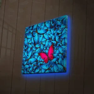 Canvastavla med LED-belysning 40x40 cm - Blåa upplysta fjärliar i bakgrunden med en rosa fjäril Blå / Rosa / Svart - Inredning Endast denna vecka