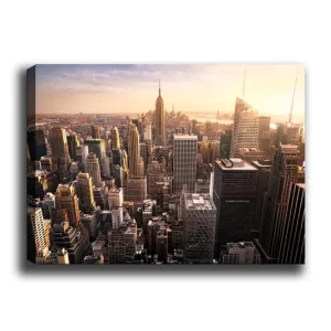 Snabb leverans Canvastavla 70x100 cm - Panoramavy av en stad med skyskrapor och den ikoniska Empire State Building i solnedgången - Inredning & dekor