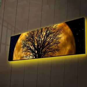 Billig Canvastavla med LED-belysning 30x90 cm - Stämningsfullt motiv av en måne bakom ett silhuett av ett träd Guld / Svart - Inredning