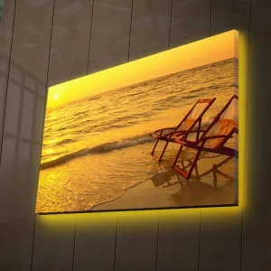 Canvastavla med LED-belysning 45x70 cm - Solnedgång över havet med två strandstolar i förgrunden Guld / Orange / Brunt - Inredning Expressleverans