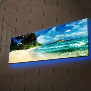 Beställ nu Canvastavla med LED-belysning 30x90 cm - Vacker strand med turkost vatten och palmer Turkos / Beige / Blå - Inredning