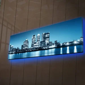 Sänkt pris Canvastavla med LED-belysning 30x90 cm - Stadssilhuett med moderna skyskrapor vid en vattenkant Blå / Svart / Vit - Inredning