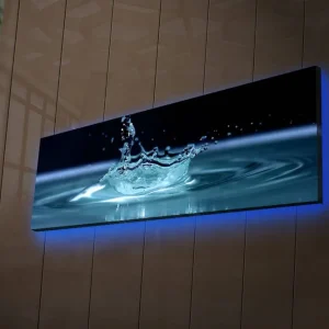 Canvastavla med LED-belysning 30x90 cm - Vattenstänk som skapar en elegant krusning i ytan Blå / Turkos - Inredning Premium