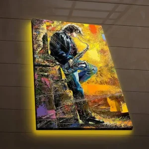 Canvastavla med LED-belysning 70x45 cm - Jazzmusiker som spelar saxofon med en livfull bakgrund Gult / Blått / Svart - Inredning Premium