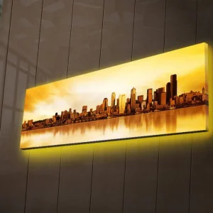 Canvastavla med LED-belysning 30x90 cm - Stadssilhuett i solnedgångens gyllene ljus Guld / Orange / Brunt - Inredning Beställ idag