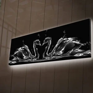Populär Canvastavla med LED-belysning 30x90 cm - Eleganta svanar i vattenrörelse Svart / Vitt / Grått - Inredning