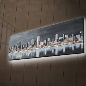 Canvastavla med LED-belysning 30x90 cm - Modern stadslandskap med silhuetter av byggnader Grå / Vit / Orange - Inredning Reapris